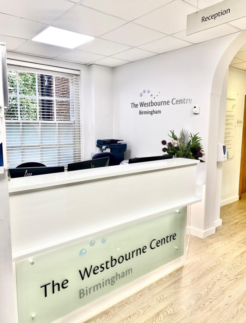 Image of the Westbourne Centre reception area, reflecting a modern and welcoming private eye doctor in Birmingham that embodies fast, personalised, and consultant-led care—offering a clear contrast to the longer wait times and standardised services of NHS cataract surgery.